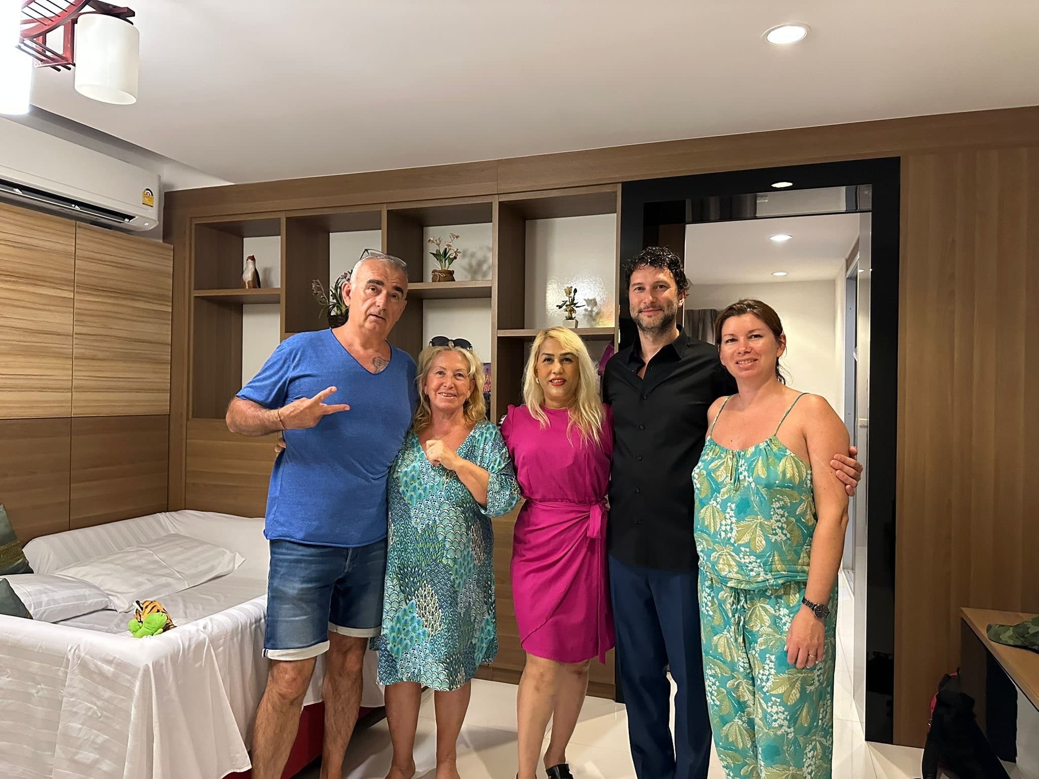 Kenny and Gita with clients during a fitting visit at their Phuket accommodation