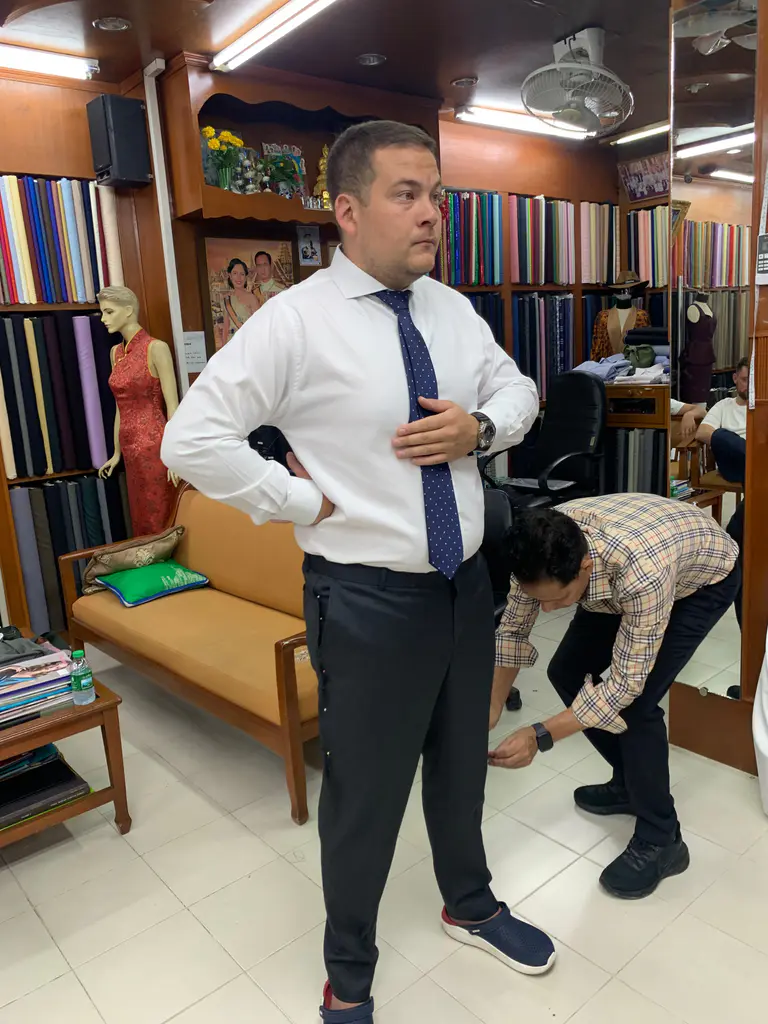 Dress shirt, tie, and trouser fitting at Kenny & Gita Tailor in Kata, Phuket