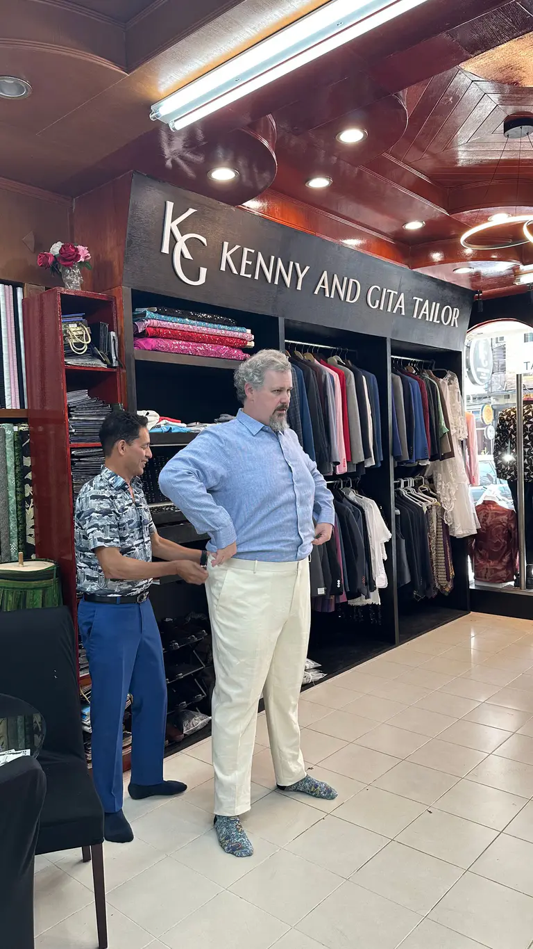 Trouser fitting session for custom tailoring at Kenny & Gita Tailor in Kata, Phuket