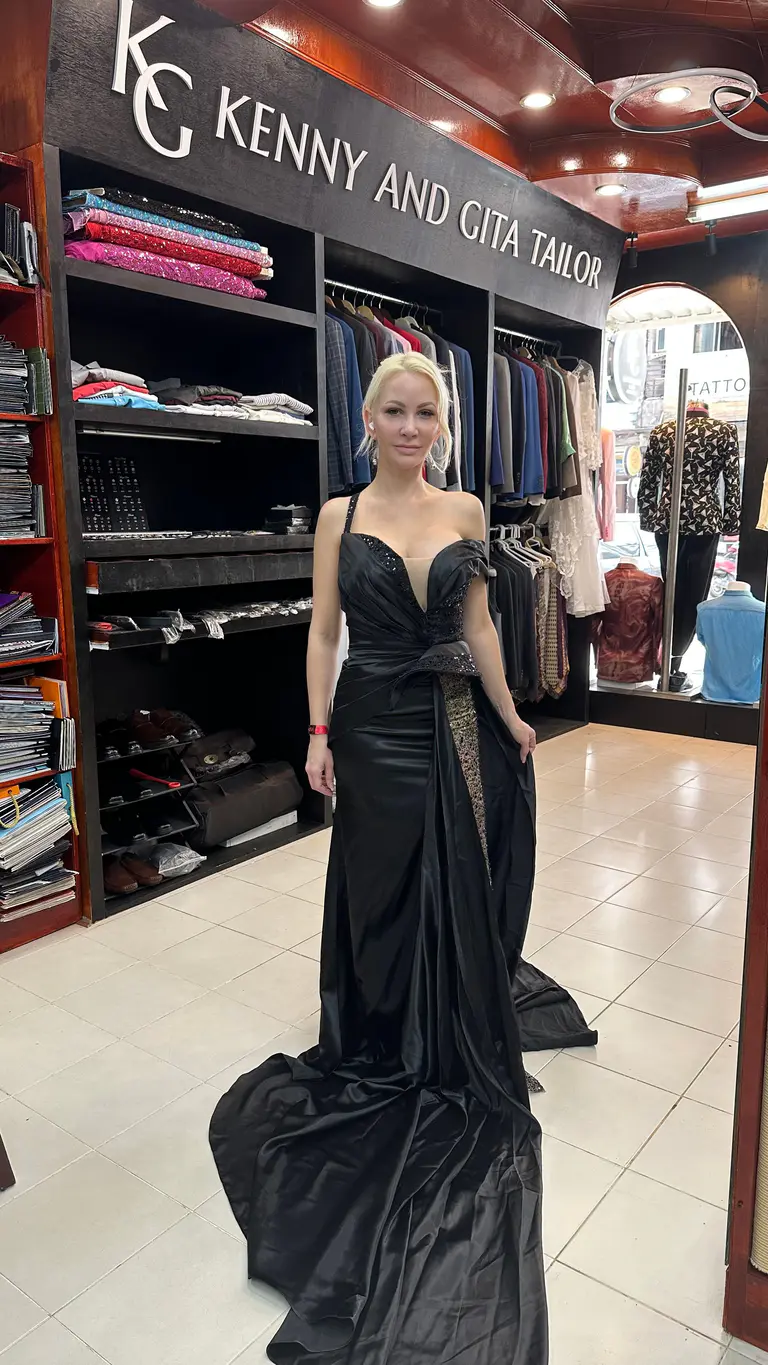 Client wearing a custom black evening dress made by Kenny & Gita Tailor in Phuket