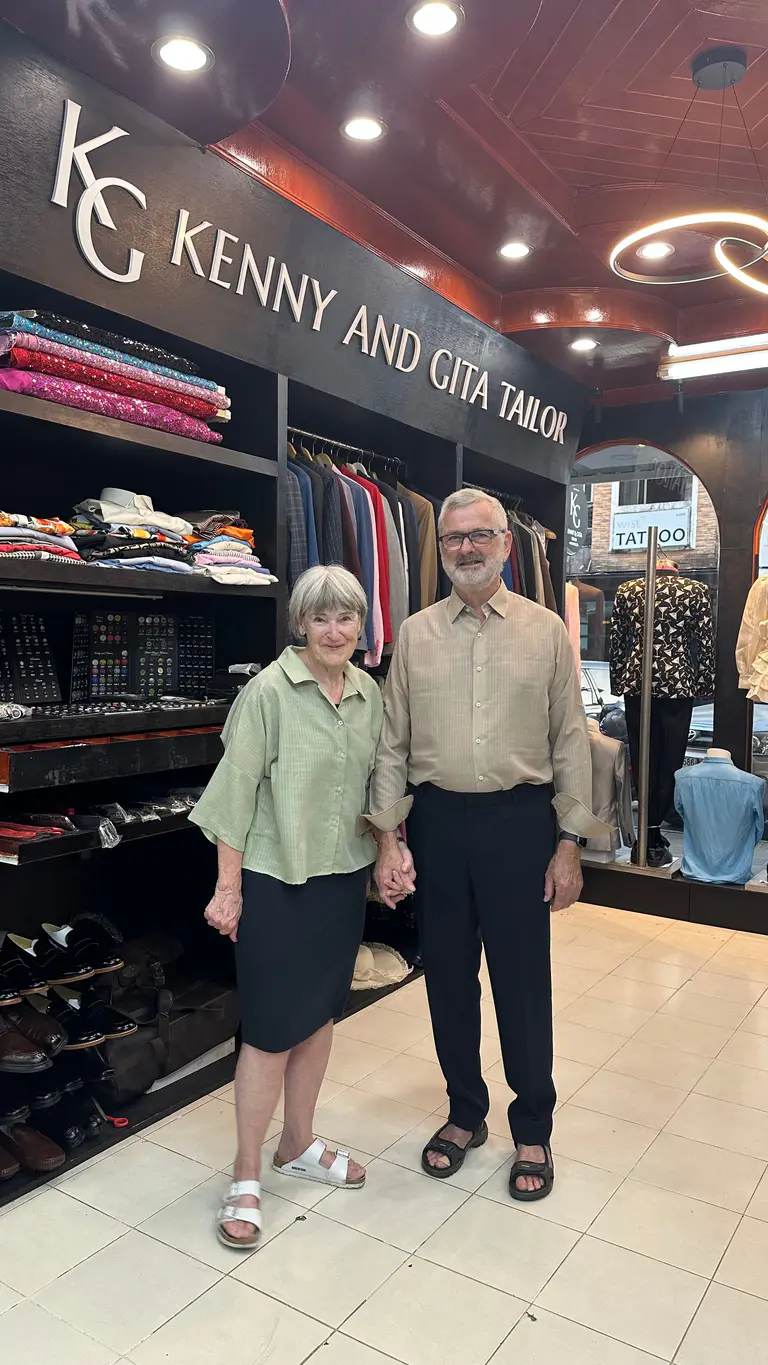 Couple after a tailoring appointment at Kenny & Gita Tailor in Kata, Phuket